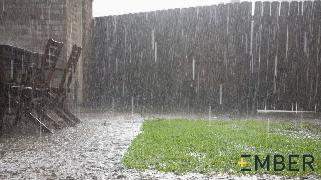 VEry wet grass with strong rain coming down